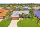 Charming single-story home featuring a well-manicured lawn, a two-car garage, and inviting curb appeal at 5742 39Th Street E Cir, Bradenton, FL 34203