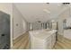 Open kitchen with modern appliances and a breakfast bar that connects to the spacious living area at 5742 39Th Street E Cir, Bradenton, FL 34203