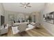 Comfortable living room with vaulted ceiling and neutral decor at 5742 39Th Street E Cir, Bradenton, FL 34203