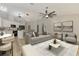 Spacious living room with contemporary decor and view of kitchen at 5742 39Th Street E Cir, Bradenton, FL 34203