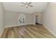 Open living area featuring light wood floors and a view of the front entrance at 5742 39Th Street E Cir, Bradenton, FL 34203
