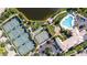 Aerial view of the recreation area including tennis courts and basketball court at 5866 Guarino Dr, Sarasota, FL 34238