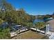 Backyard with a dock and access to the water at 6113 55Th E Ter, Bradenton, FL 34203