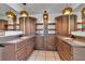 Bathroom featuring a soaking tub, stylish fixtures, and ample counter space at 6113 55Th E Ter, Bradenton, FL 34203