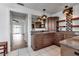 Bathroom featuring a soaking tub, stylish fixtures, and ample counter space at 6113 55Th E Ter, Bradenton, FL 34203