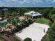 Aerial shot of the community pool, pool house, sand volleyball court, and other great amenities at 6125 Anise Dr, Sarasota, FL 34238