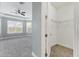 Bedroom featuring neutral carpet and walk-in closet at 6125 Anise Dr, Sarasota, FL 34238
