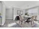 Elegant dining room featuring a modern table, stylish chairs, and a chic chandelier at 6125 Anise Dr, Sarasota, FL 34238
