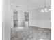Open living space boasting tile floors, recessed lighting, and seamless flow into the kitchen and outdoor areas at 6125 Anise Dr, Sarasota, FL 34238