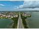 An aerial view shows condo buildings with golf course and waterway views at 6372 Palma Del Mar S Blvd # 503, St Petersburg, FL 33715