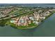 An aerial view captures waterfront condo buildings with a pool and well-kept grounds at 6372 Palma Del Mar S Blvd # 503, St Petersburg, FL 33715