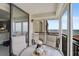 Balcony with table and chairs for relaxing and enjoying the view of the waterway at 6372 Palma Del Mar S Blvd # 503, St Petersburg, FL 33715