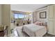 Bedroom featuring built-in Murphy bed with desk and storage shelving at 6372 Palma Del Mar S Blvd # 503, St Petersburg, FL 33715