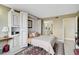 Bedroom featuring a built-in Murphy bed and access to ensuite bathroom at 6372 Palma Del Mar S Blvd # 503, St Petersburg, FL 33715