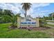 Community sign for Palma del Mar with lush landscaping at 6372 Palma Del Mar S Blvd # 503, St Petersburg, FL 33715