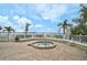 Outdoor hot tub with a scenic view of the water and palm trees at 6372 Palma Del Mar S Blvd # 503, St Petersburg, FL 33715