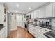 Updated kitchen with stainless steel appliances and granite countertops at 6372 Palma Del Mar S Blvd # 503, St Petersburg, FL 33715