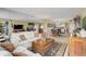 Comfortable living room leading to dining area and kitchen at 6372 Palma Del Mar S Blvd # 503, St Petersburg, FL 33715