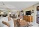 Open layout living room with view to dining and kitchen area at 6372 Palma Del Mar S Blvd # 503, St Petersburg, FL 33715