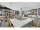 Recreation room with couches, chairs, tables, bookshelves, and an outside view at 6372 Palma Del Mar S Blvd # 503, St Petersburg, FL 33715