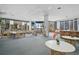 Recreation room filled with chairs, tables, bookshelves, and an ocean view at 6372 Palma Del Mar S Blvd # 503, St Petersburg, FL 33715