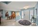 Light-filled foyer with neutral paint and tile flooring leads to the dining room at 7804 Broadmoor Pines Blvd, Sarasota, FL 34243