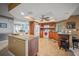 Spacious kitchen with granite countertops, tile flooring, and a breakfast bar with seating at 7804 Broadmoor Pines Blvd, Sarasota, FL 34243