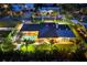 Aerial view of home with screened pool, lush landscaping and neighborhood at 7913 19Th Avenue W Dr, Bradenton, FL 34209