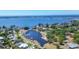 Stunning aerial view showcases the bay and marina featuring boats in a beautiful waterfront community at 7913 19Th Avenue W Dr, Bradenton, FL 34209