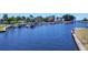 Picturesque marina featuring boats docked on a tranquil waterway near residential homes at 7913 19Th Avenue W Dr, Bradenton, FL 34209