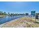 Waterfront park area overlooking the marina, featuring boats and a beautiful waterfront community at 7913 19Th Avenue W Dr, Bradenton, FL 34209