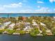 Waterfront property with a beautiful view of the canal and other homes in the area at 8234 Midnight Pass Rd, Sarasota, FL 34242