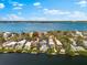 Waterfront home boasts a pool and lush yard, offering serene waterfront living and privacy at 8234 Midnight Pass Rd, Sarasota, FL 34242