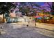 Charming backyard oasis featuring decorative gravel, landscaping, and a cozy, inviting ambiance at 8234 Midnight Pass Rd, Sarasota, FL 34242