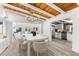 Bright dining area seamlessly blends with a modern kitchen and comfortable living space at 8234 Midnight Pass Rd, Sarasota, FL 34242