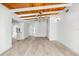 Spacious open-concept living space with wood plank ceilings and ample natural light at 8234 Midnight Pass Rd, Sarasota, FL 34242