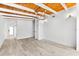 Inviting open-concept living space with wood plank ceilings and neutral finishes at 8234 Midnight Pass Rd, Sarasota, FL 34242