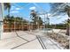 Spacious screened-in porch with view of pool and backyard at 8234 Midnight Pass Rd, Sarasota, FL 34242