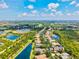 Beautiful aerial view overlooking waterfront properties and a golf course at 8930 Bloomfield Blvd, Sarasota, FL 34238