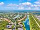 Scenic aerial shot showcasing the waterfront homes and a long, peaceful waterway at 8930 Bloomfield Blvd, Sarasota, FL 34238