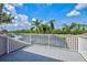 Enjoy the serene lake view on this spacious balcony! at 8930 Bloomfield Blvd, Sarasota, FL 34238