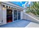 Open balcony with awning leading into game room at 8930 Bloomfield Blvd, Sarasota, FL 34238