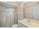 Bathroom featuring shower with glass door and modern sink vanity at 8930 Bloomfield Blvd, Sarasota, FL 34238