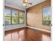 Cozy bedroom with beautiful wall color and natural light from the window at 8930 Bloomfield Blvd, Sarasota, FL 34238