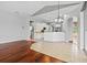 Bright kitchen with white cabinetry, stainless steel appliances, and tile floors at 8930 Bloomfield Blvd, Sarasota, FL 34238