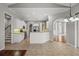 Well-lit kitchen featuring stainless steel appliances and plenty of counter space and easy access to living areas at 8930 Bloomfield Blvd, Sarasota, FL 34238