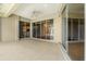 Tile covered patio area with access to other rooms at 8930 Bloomfield Blvd, Sarasota, FL 34238