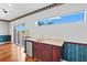Relax and unwind at this wet bar with updated cabinetry and floors at 8930 Bloomfield Blvd, Sarasota, FL 34238
