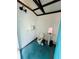 Functional bathroom featuring a toilet, sink, and shelves at 1019 10Th W Ave, Bradenton, FL 34205