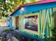 Unique home with vibrant colors, bamboo accents, and a peacock mural at 1019 10Th W Ave, Bradenton, FL 34205